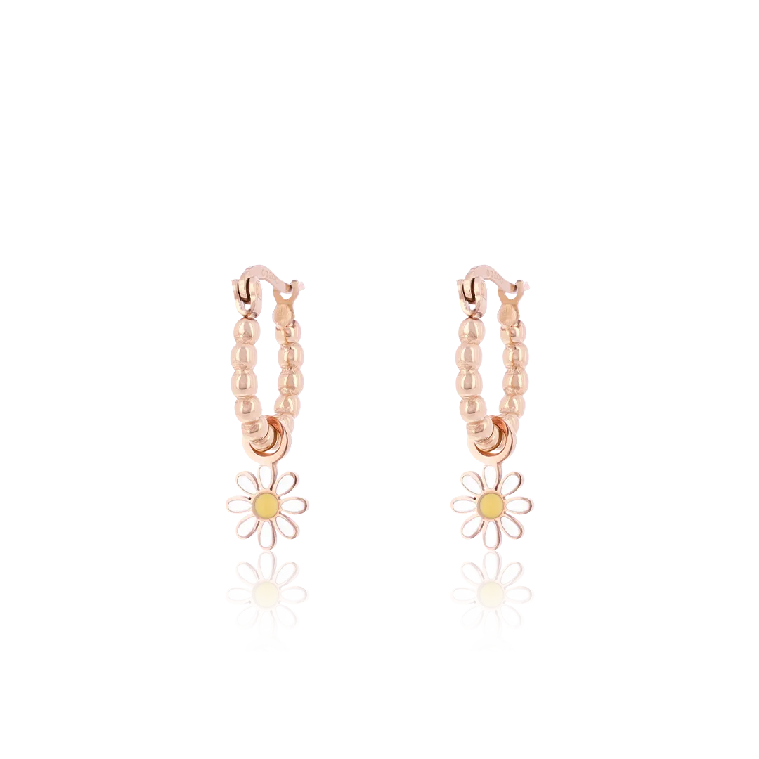 Rose gold coloured hoop earrings with a flower charm